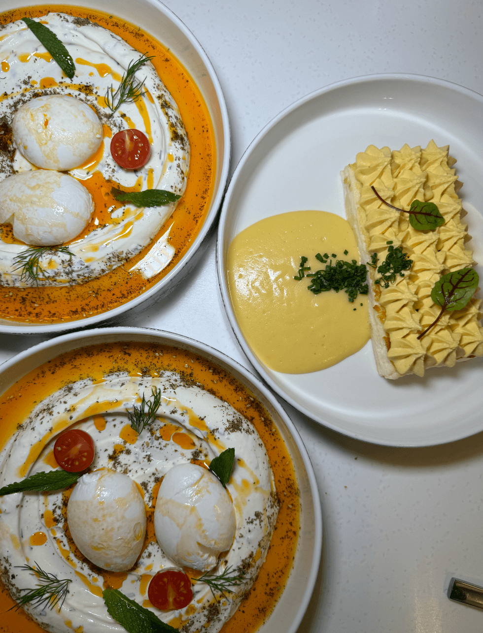 Three brunch plates from Miss Aida in Toronto.