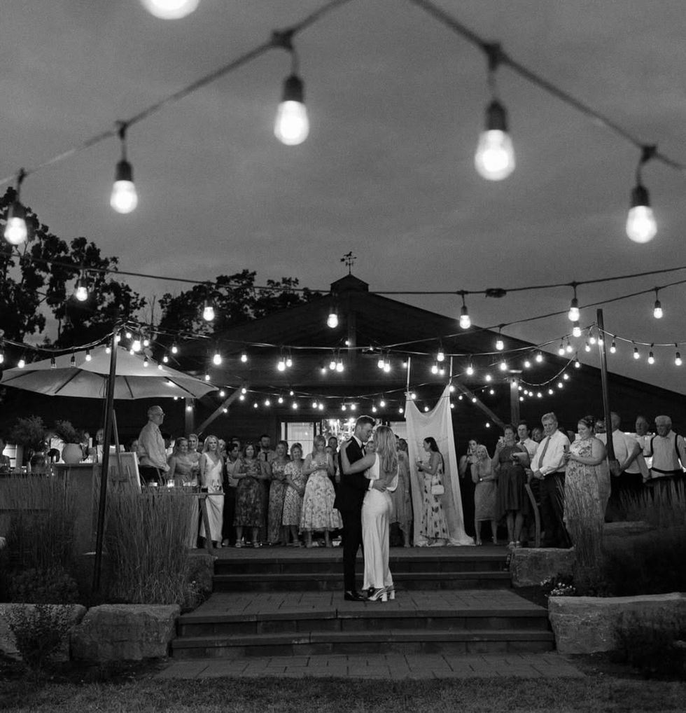 A couple dancing at a wedding.