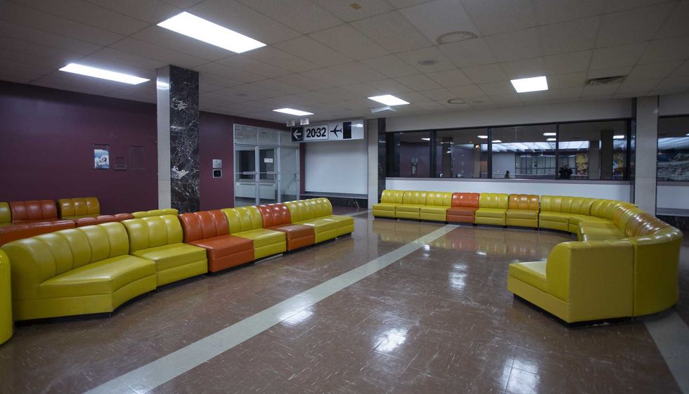 Mid-century modern furniture in an airport lounge.