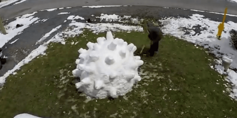 A COVID-19 Snow Sculpture Was Erected On Someone's Front Lawn This Weekend