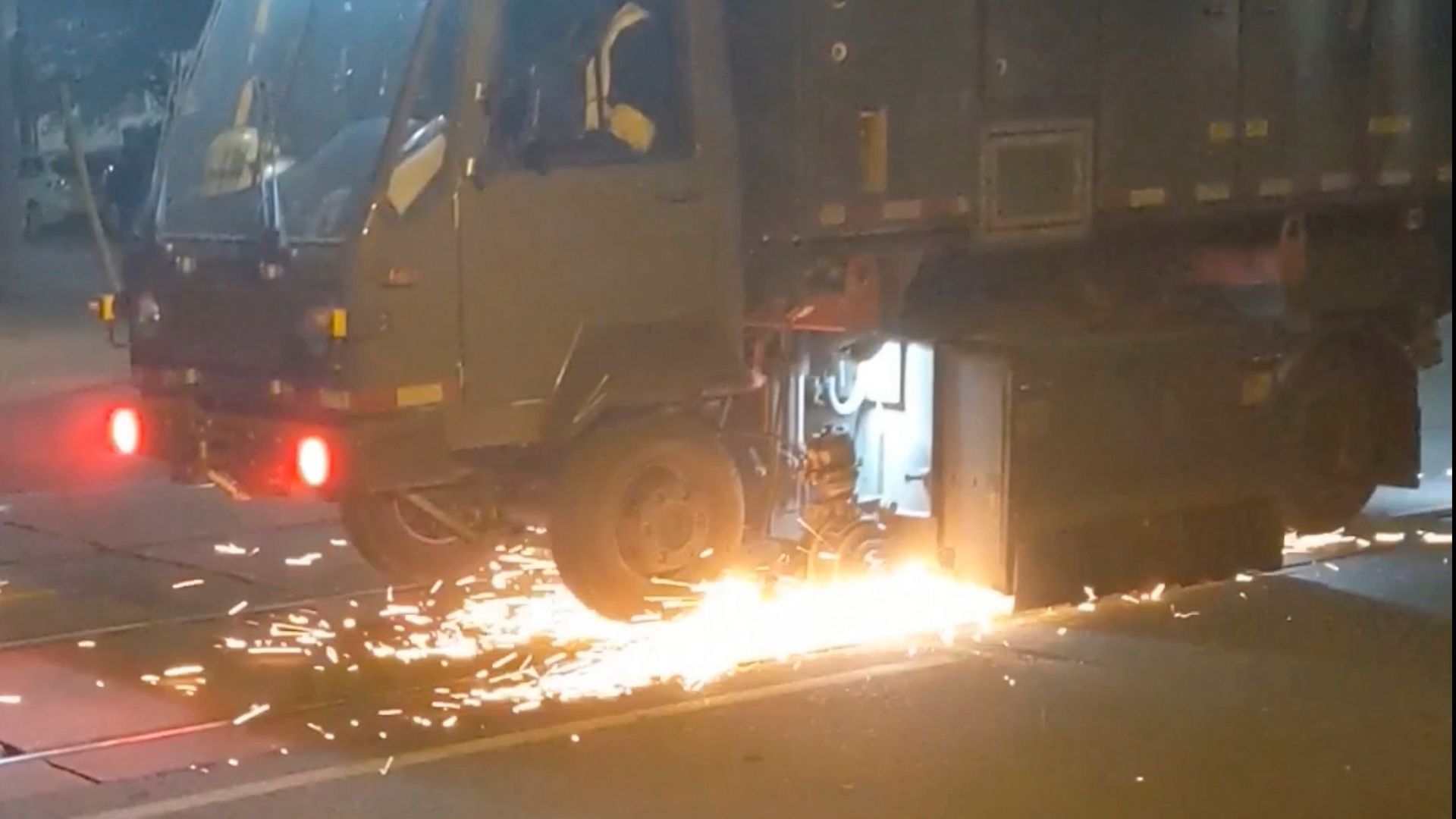 Sparks Fly As Monster Machine Grinds Up Toronto Streetcar Tracks (VIDEO)
