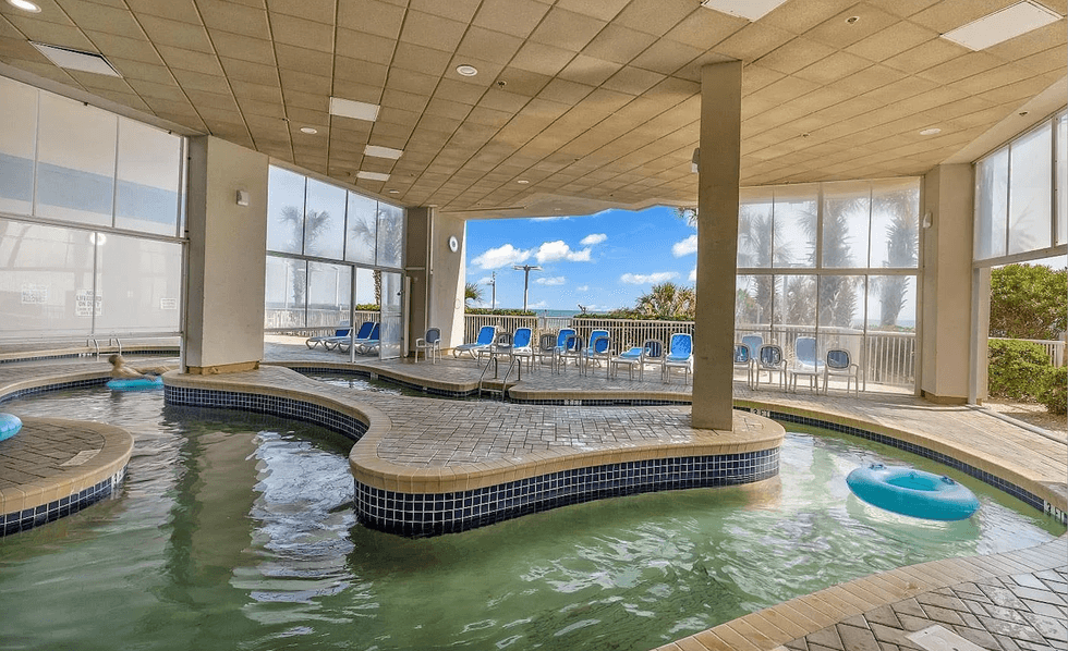 The building's indoor pool resembles a lazy river.