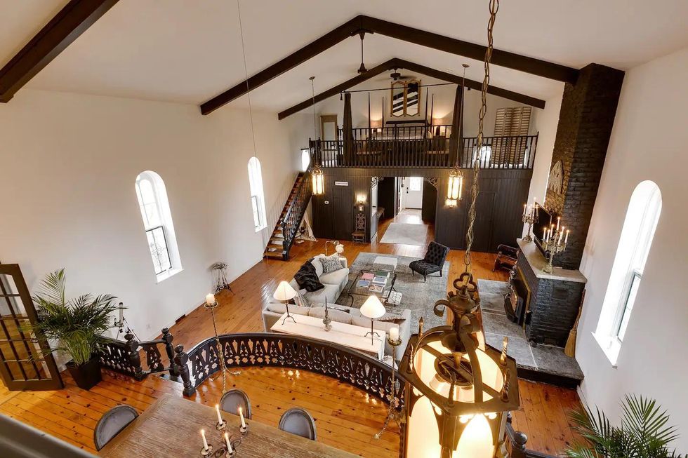 Looking down from the loft at the living room.