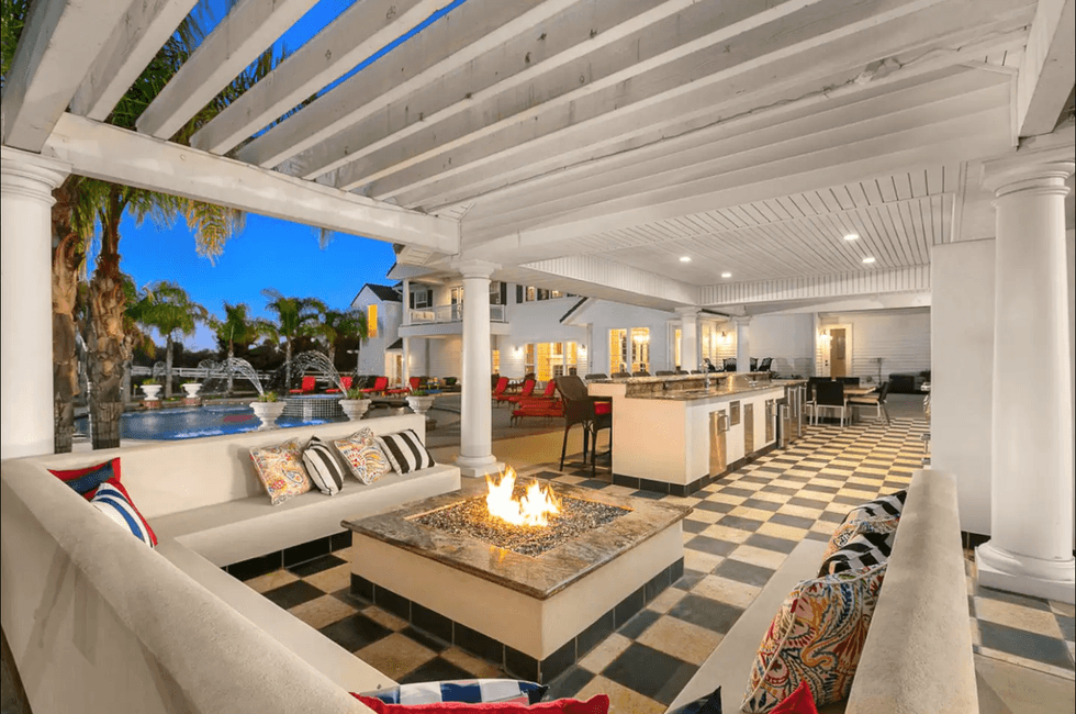The outdoor patio with fire pits and checkered floors overlooking the hills of Temecula, CA.