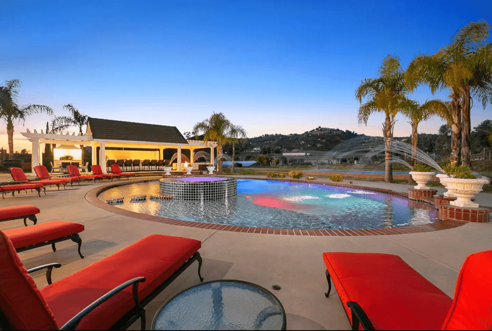 The backyard pool and spa overlooking the hills of Temecula, CA.