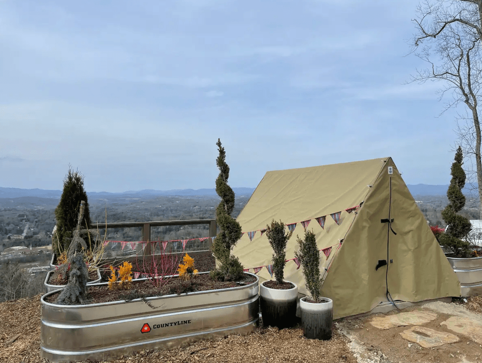 Alchemy - Treehouse of Serenity overlooks the mountain range.