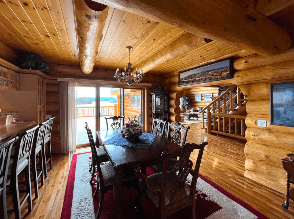 Dining area in log home.