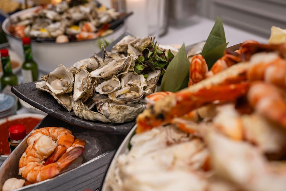 Plates of various seafood at Mademoiselle.