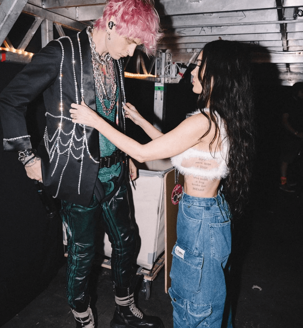 MGK and Megan Fox backstage in Miami.