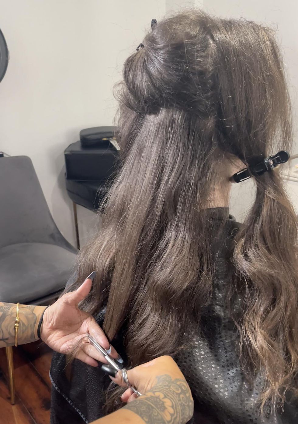 Hair getting cut while dry.