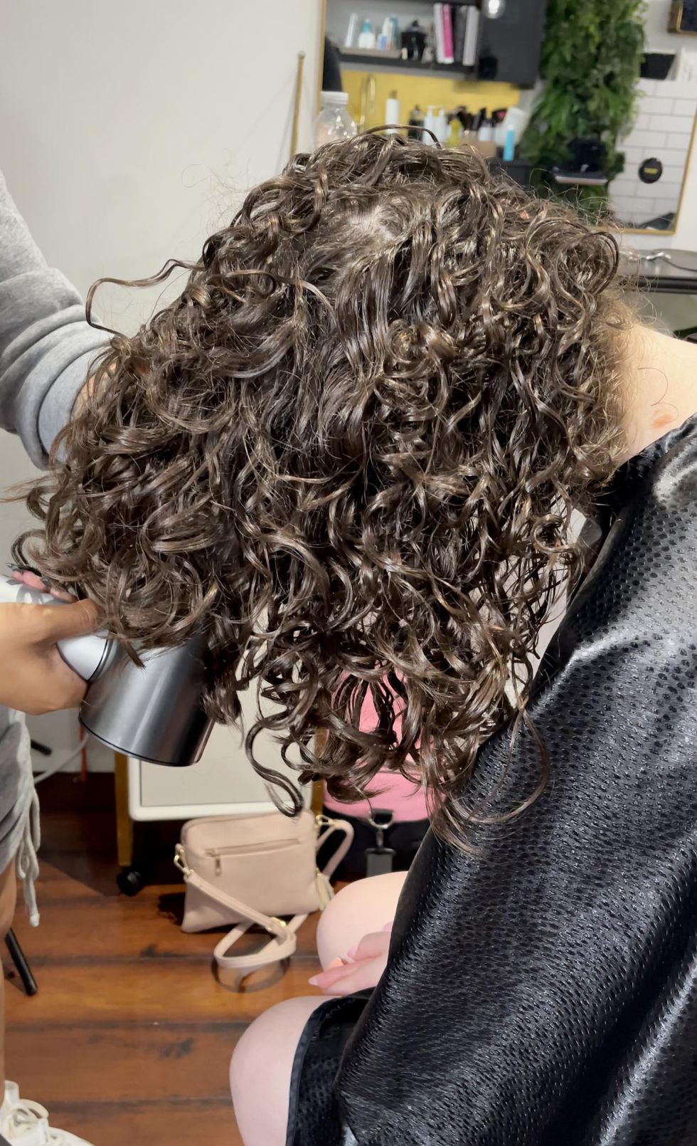 Curly hair being diffused.