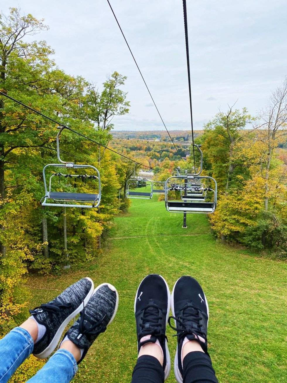 Chairlift ride through the fall colours.