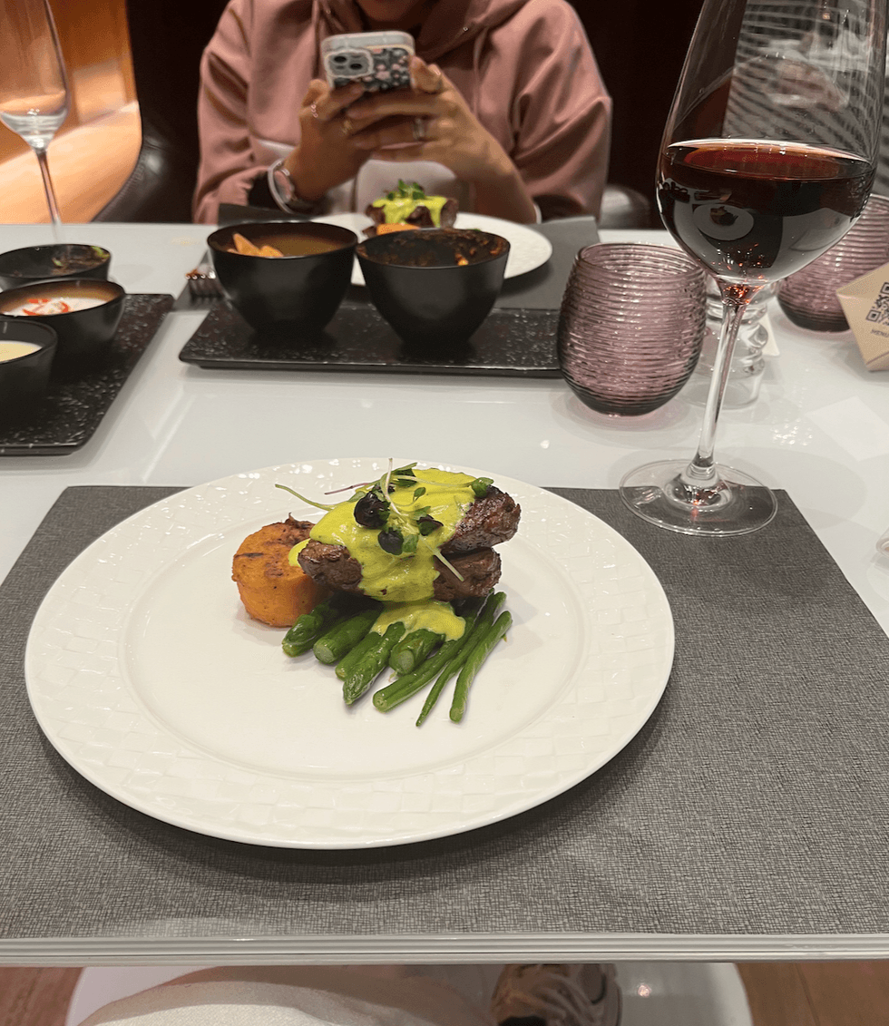 The steak and asparagus at the Qatar Airways Al Mourjan Business Lounge.
