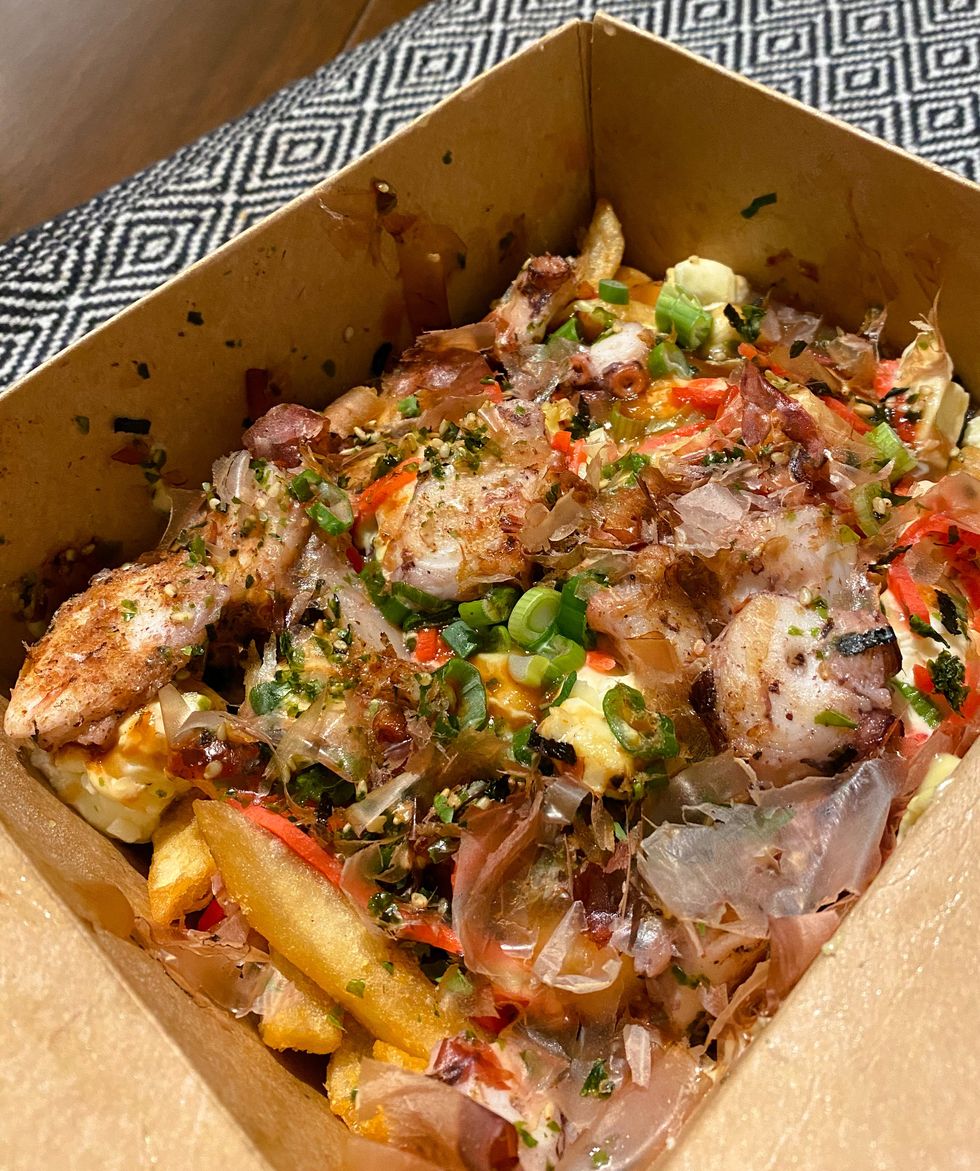 Poutine La Tonkiyaki re\u00e7ue par Fran\u00e7oise.