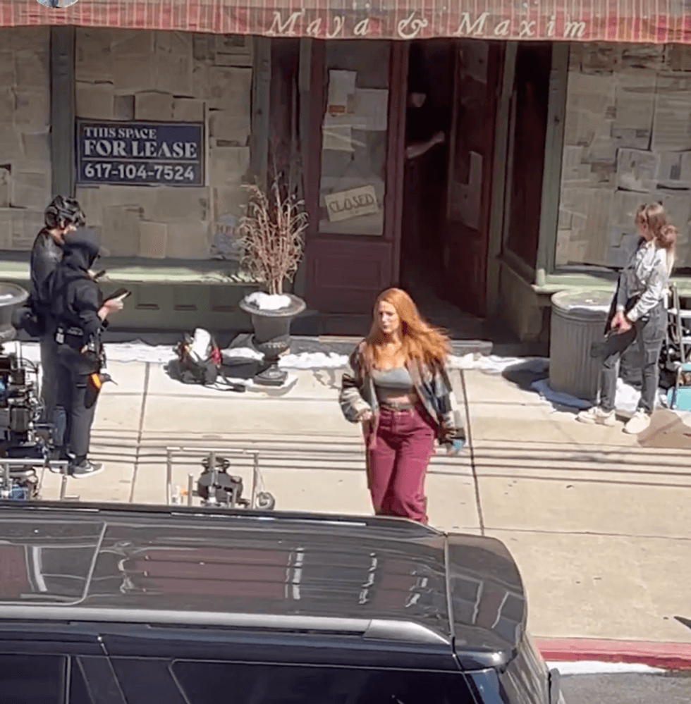 Blake Lively walking on set.