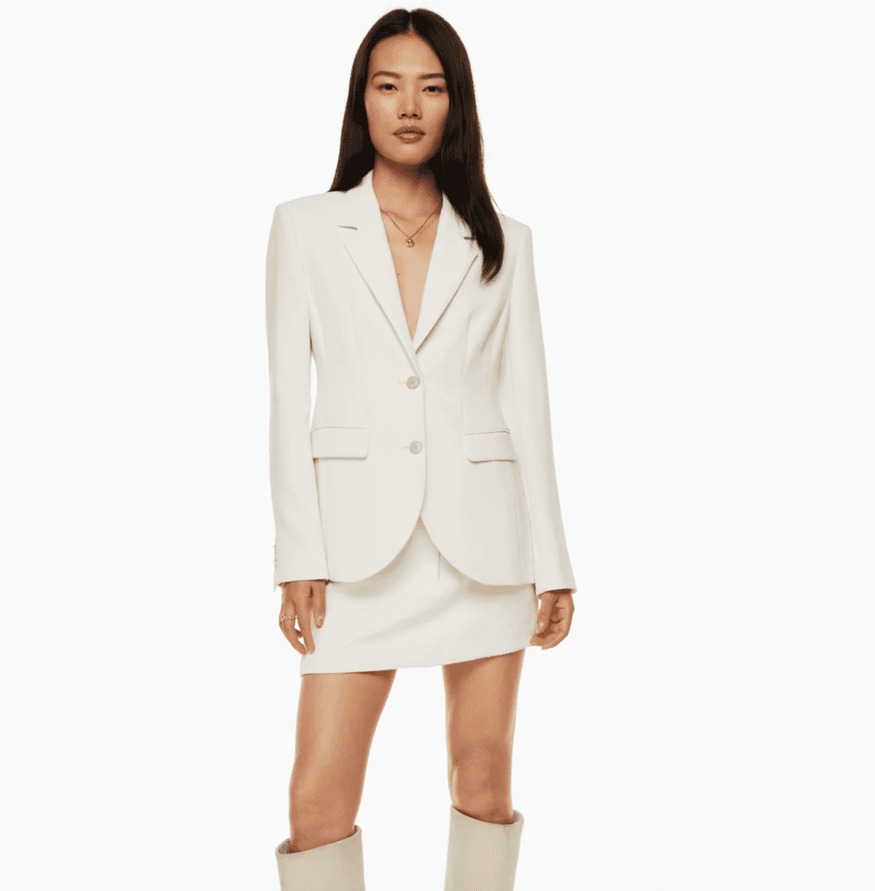 An Aritzia model wearing the Signature Blazer.
