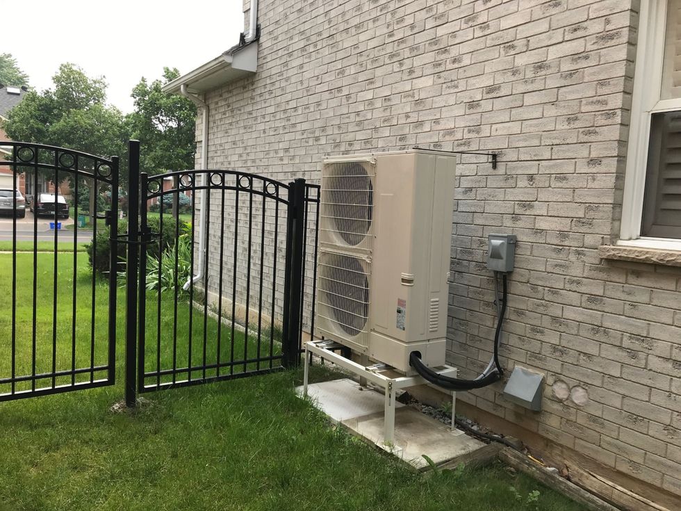 A heat pump outside a home.
